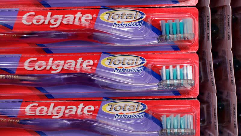Colgate toothbrushes on display in Palo Alto, Calif., Wednesday, Oct. 29, 2008. Brushing your teeth right after eating may cause damage to your enamel.