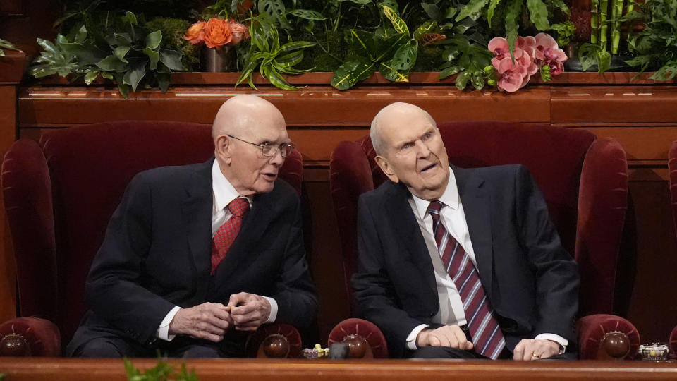 President Russell M. Nelson, right, speaks with counselor Dallin H. Oaks during The Church of Jesus Christ of Latter-day Saints conference, Sunday, April 7, 2024, in Salt Lake City. (AP Photo/Rick Bowmer)