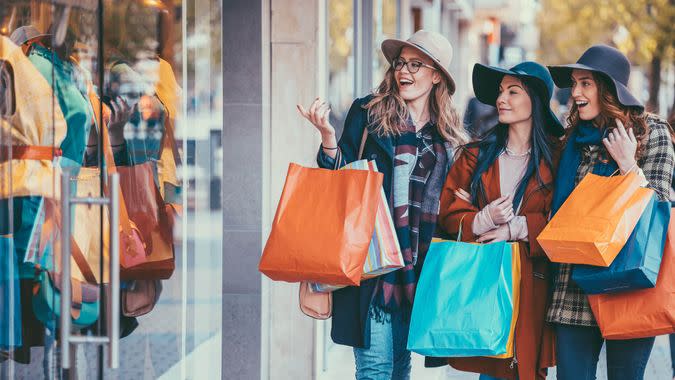 Young women enjoying a window shopping.