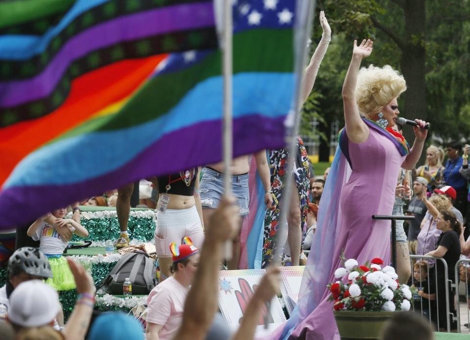 Grand marshal drag queen Nina West (Andrew Levitt) waves to the crowd during the 2019 Stonewall Columbus Pride Parade.