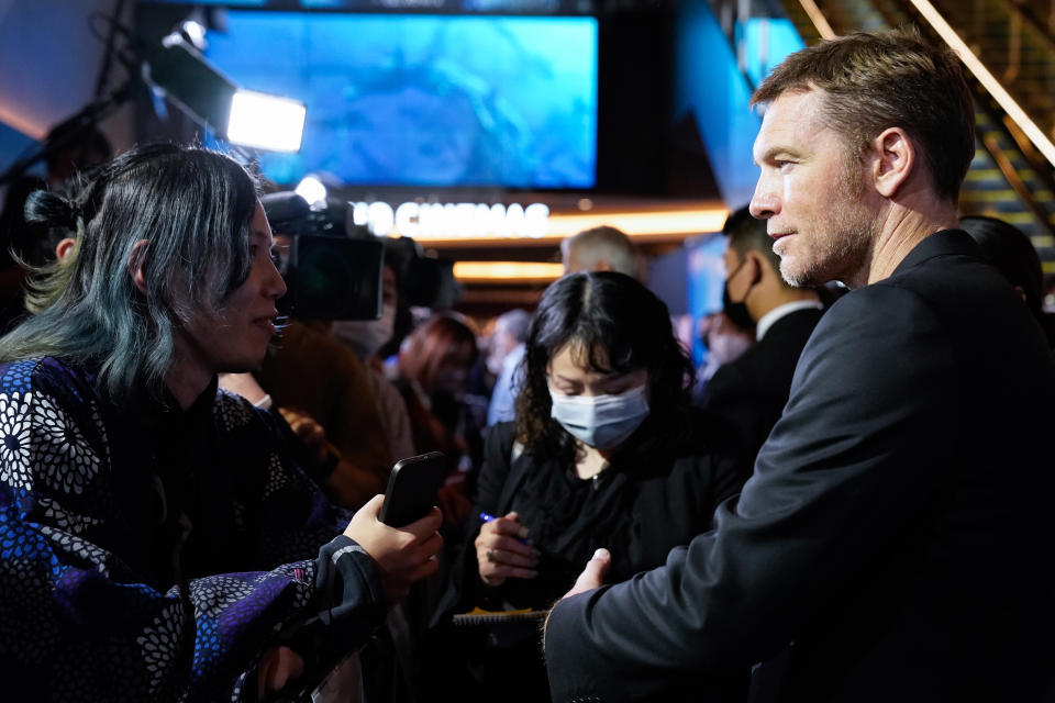 TOKYO, JAPAN – DECEMBER 10: Sam Worthington greets fans during the “Avatar: The Way of Water” Japan Premiere at TOHO Cinemas Hibiya on December 10, 2022 in Tokyo, Japan. (Photo by Christopher Jue/Getty Images for Disney)