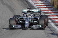 Mercedes driver Lewis Hamilton of Britain, center steers his racer during the qualifying session practice at the 'Sochi Autodrom' Formula One circuit, in Sochi, Russia, Saturday, Sept.28, 2019. The Formula one race will be held on Sunday. (AP Photo/Luca Bruno)