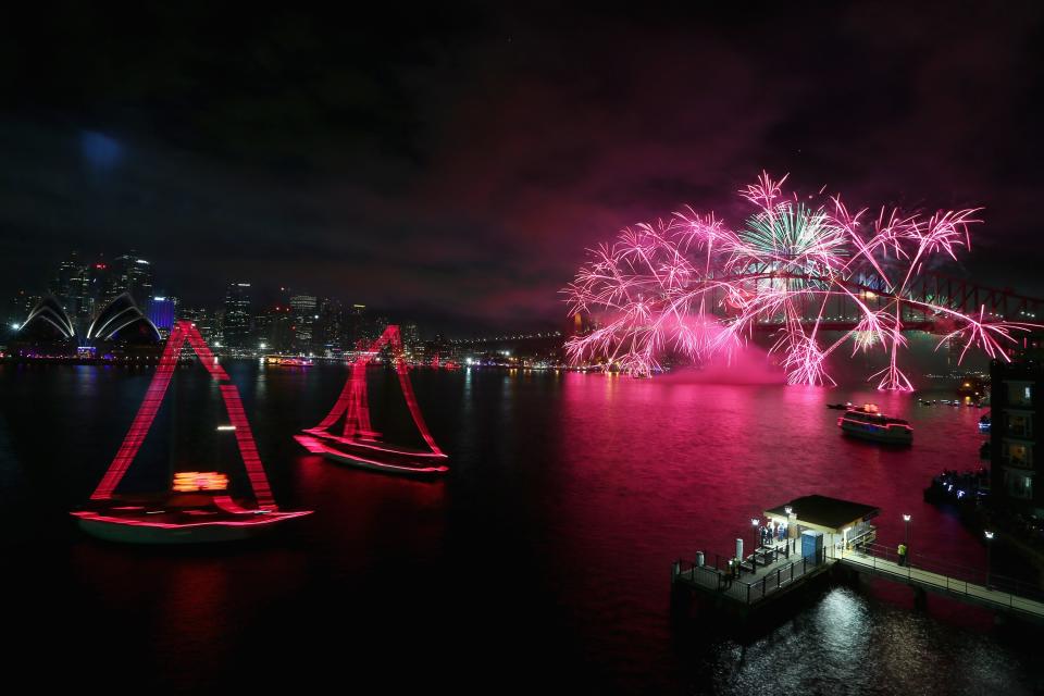 SYDNEY, AUSTRALIA - DECEMBER 31: Fireworks light up the sky above the Sydney Harbour Bridge at midnight during New Years Eve celebrations on Sydney Harbour on December 31, 2012 in Sydney, Australia. (Photo by Cameron Spencer/Getty Images)