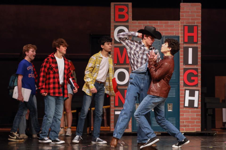 Junior Domenick Bierman, right, who plays Ren McCormack, and senior Ian Morris, who plays Willard Hewitt, rehearse a scene for the musical "Footloose" at Mamaroneck High School, Jan. 24, 2023. The cast will perform the musical from Feb. 9-11.