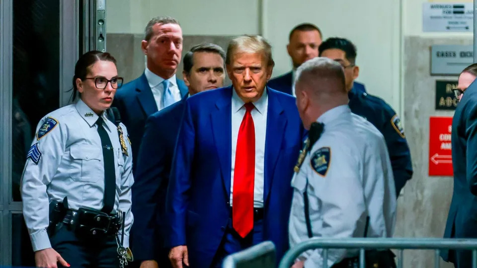 PHOTO: Former President Donald Trump arrives for his hearing to determine the date of his trial for allegedly covering up hush money payments linked to extramarital affairs, at Manhattan Criminal Court in New York City on March 25, 2024. (Justin Lane/POOL/AFP via Getty Images)