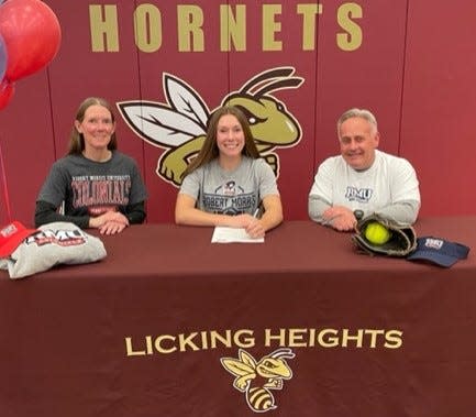 Licking Heights senior Kaylyn Hopf recently signed her letter of intent to play softball at Robert Morris.