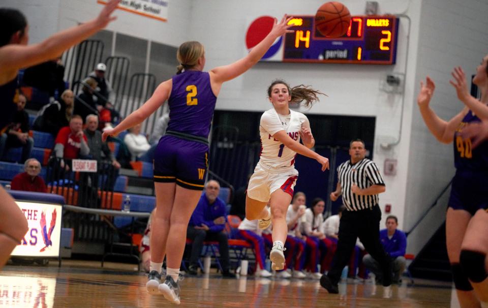 Pleasant Plains' Adi Fraase dishes a long pass against Williamsville during the Sangamon County girls basketball tournament championship game at the Hawk Center in Riverton on Thursday, Jan. 18, 2024.