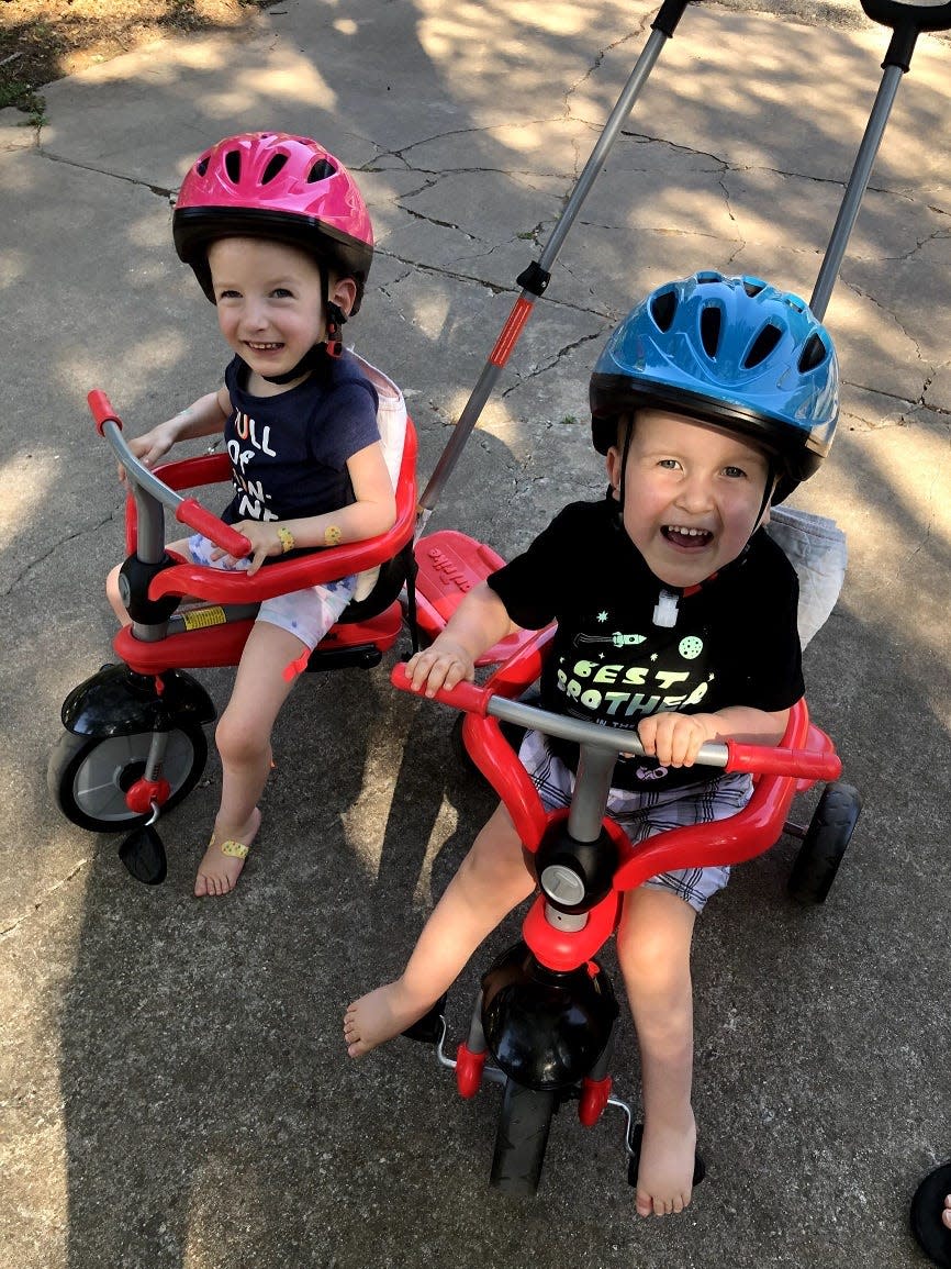 Adelaide and Gray Carter are now able to use tricycles. She is able to move hers on her own. He is getting close.