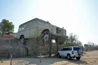 <p>The Emirates National Auto Museum is located in a pyramid-shaped building that’s about an hour away from central Abu Dhabi in the United Arab Emirates. After leaving the city, getting there is a matter of following the long, straight roads that cross the desert. You know you’ve arrived when you see a mammoth replica of a <strong>Land Rover Series 3 </strong>that effortlessly dwarfs a Nissan Patrol.</p>