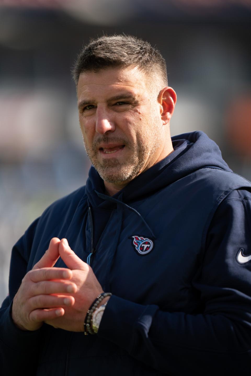 Tennessee Titans Head Coach Mike Vrabel runs warmups before their game against the Jacksonville Jaguars at Nissan Stadium in Nashville, Tenn., Sunday, Jan. 7, 2024.