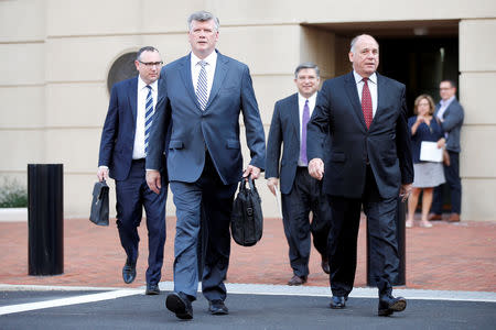Defense attorneys Brian Ketcham, Kevin Downing, Richard Westling and Thomas Zehnle leave the U.S. District Courthouse following the first day of jury deliberations in former Trump campaign manager Paul Manafort's trial on bank and tax fraud charges stemming from Special Counsel Robert Mueller's investigation of Russia's role in the 2016 U.S. presidential election, in Alexandria, Virginia, U.S., August 16, 2018. REUTERS/Chris Wattie