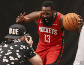 "Give me your best 'Somebody just barely grazed me on a 3-point attempt' face." — Cameraman to James Harden, god willing