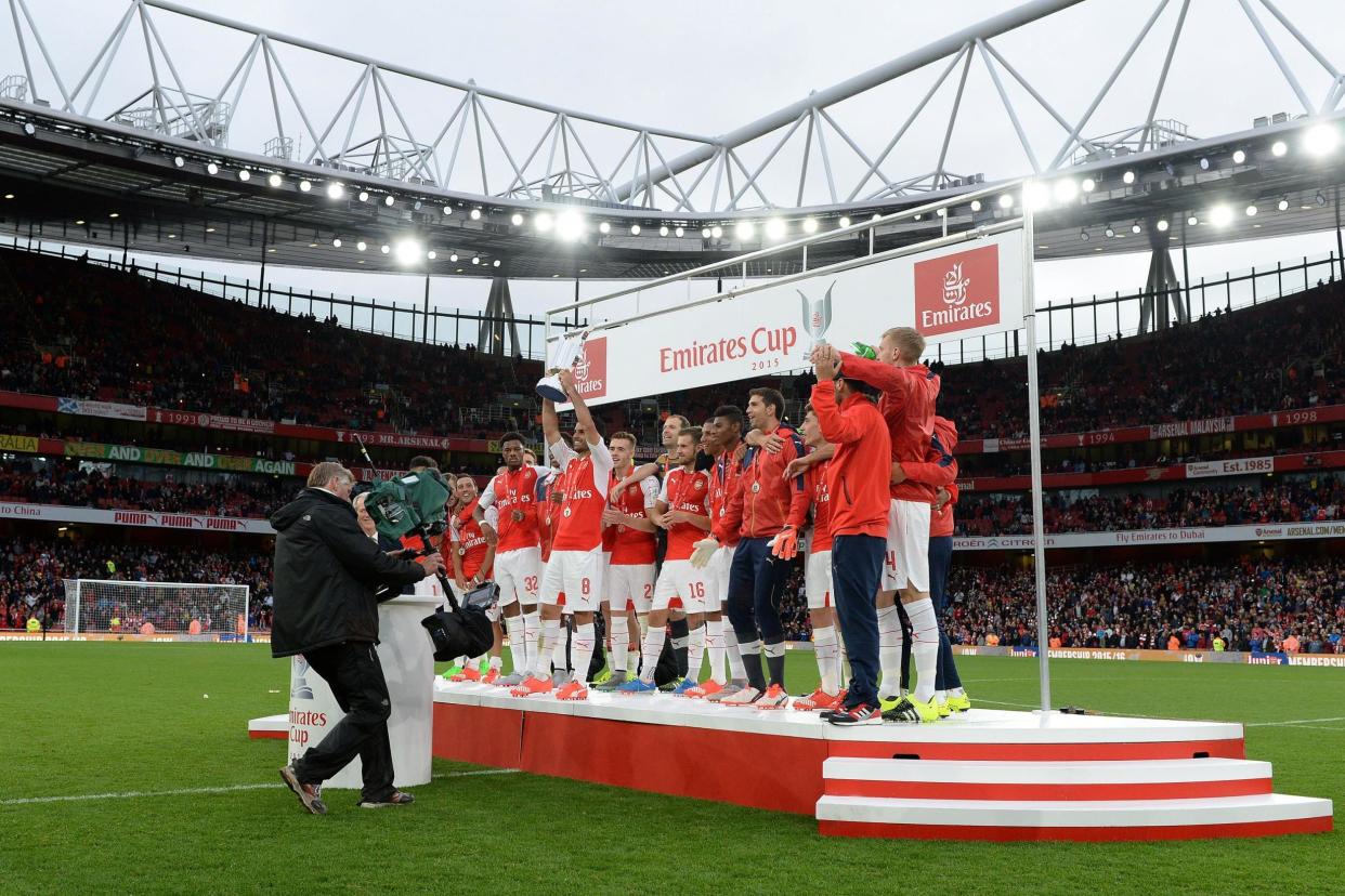 Arsenal celebrate their 2015 Emirates Cup win: Arsenal FC via Getty Images