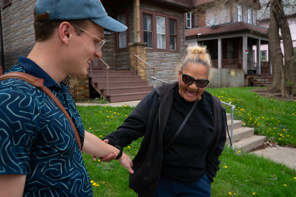 Kevin visits with Shirley Frazier, who recently moved out of Mitchell Court, a separate Milwaukee public housing development. (Sarah L. Voisin/The Washington Post)