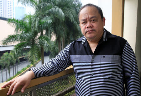 A Filipino lawyer Jude Sabio posed for a picture in Metro Manila, Philippines February 10, 2018. REUTERS/Romeo Ranoco