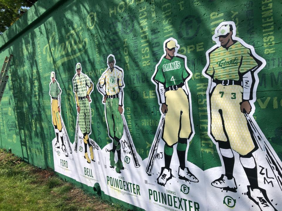 These likenesses of players for the Foundry Giants have been added to the wall of Foundry Field at Southeast Park in South Bend. Boys and Girls Club members designed them.