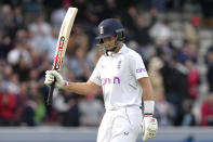 England's Joe Root acknowledges applause as he leaves the pitch at the end of play on the third day of the test match between England and New Zealand at Lord's cricket ground in London, Saturday, June 4, 2022. (AP Photo/Kirsty Wigglesworth)