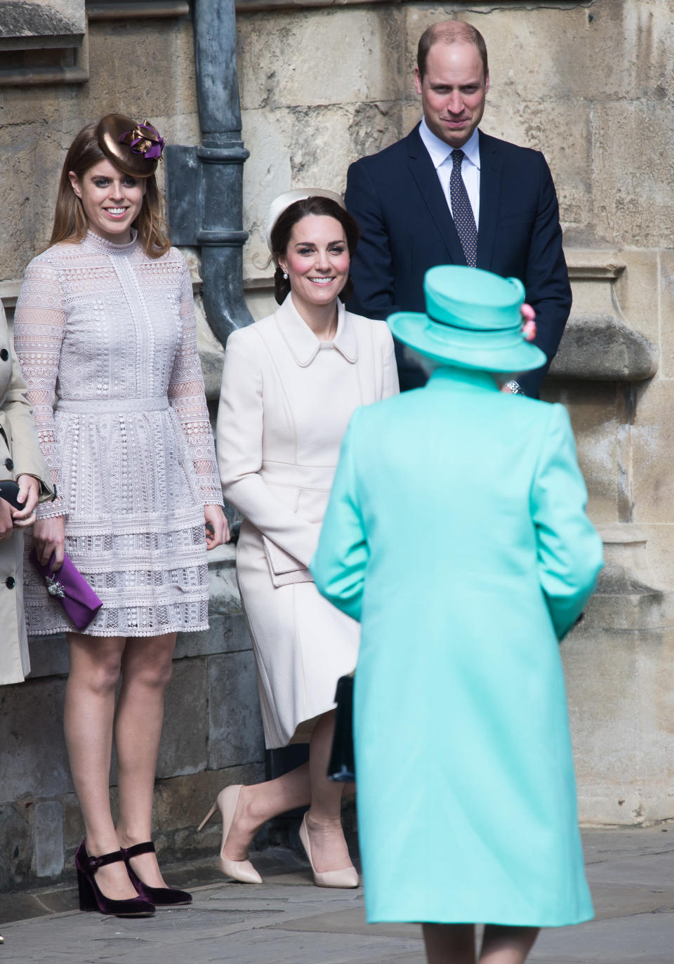 <p>Kate curtsies to the Queen as she arrives for a church service. <em>[Photo: PA]</em> </p>