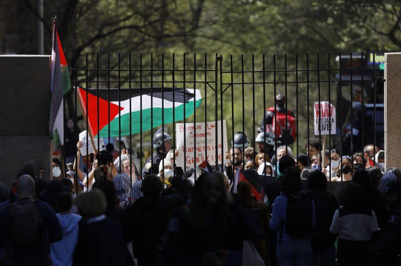 Pro-Palestinian protestors demonstrate at Columbia University in New York on Monday. Columbia University announced that classes would be held remotely starting Monday, as pro-Palestinian protests continued for the sixth day on the school's campus. Photo by John Angelillo/UPI