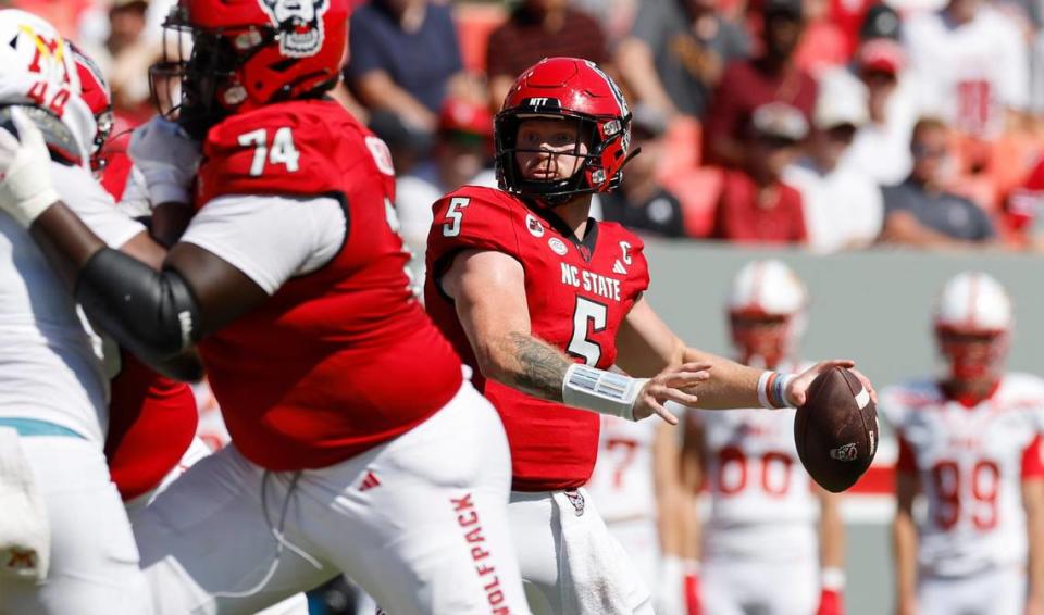 N.C. State quarterback Brennan Armstrong (5) looks downfield to pass during the first half of N.C. State’s game against VMI at Carter-Finley Stadium in Raleigh, N.C., Saturday, Sept. 16, 2023.