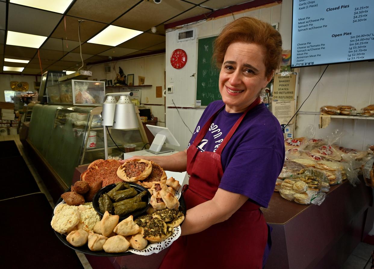 George’s Bakery owner Christine Elhoussan with her platter of tasty appetizers.