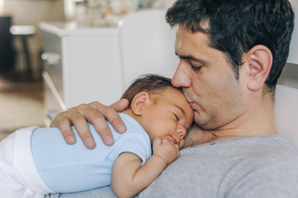 Fathers reporting higher motivation and engagement toward parenthood were experiencing a greater reduction in gray matter volume in the cerebral cortex, according to study (Getty Images)