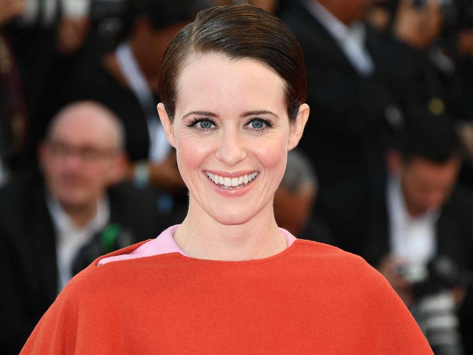 <p>Dominique Charriau/WireImage</p> Claire Foy walks the red carpet ahead of the opening ceremony and the 