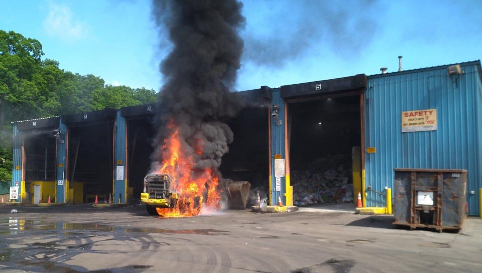 Firefighters in Holliston extinguished an equipment fire that occurred Monday morning at Covanta, a transfer station on Washington Street. No one was injured but a front-end loader estimated to be worth $500,000 was destroyed.