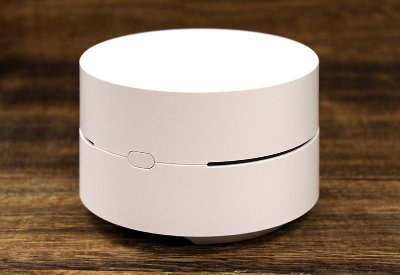 Google Wifi has a very clean design. A ring of LED light acts as a status indicator and there's a single reset button that's easily accessible on the side of the node.