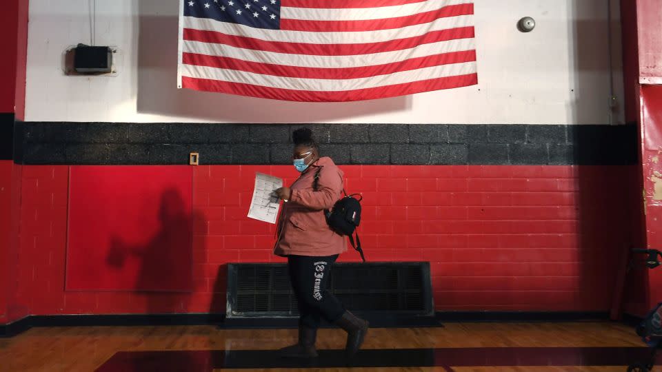 A voter casts their ballot at a polling location in St. Louis, Missouri, in November 2020. The Searle trust has given millions to the Foundation for Government Accountability, which has worked behind the scenes to push conservative policies such as stricter voting laws. - Michael B. Thomas/Getty Images