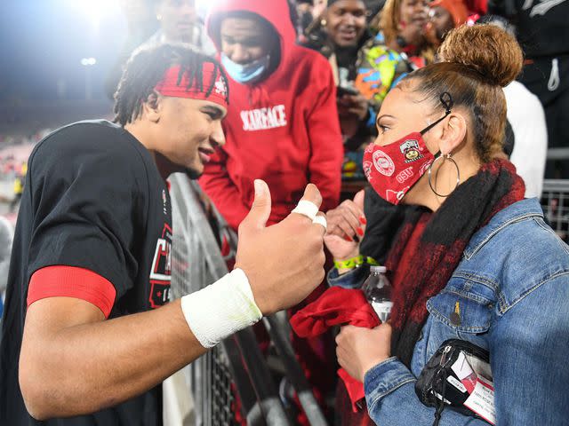 <p>Kirby Lee / Alamy</p> C.J. Stroud and his mother, Kim Stroud, after the Rose Bowl game against the Utah Utes on Jan. 1, 2022.