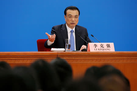 Chinese Premier Li Keqiang speaks at a news conference following the closing session of the National People's Congress (NPC) at the Great Hall of the People in Beijing, China March 15, 2019. REUTERS/Thomas Peter