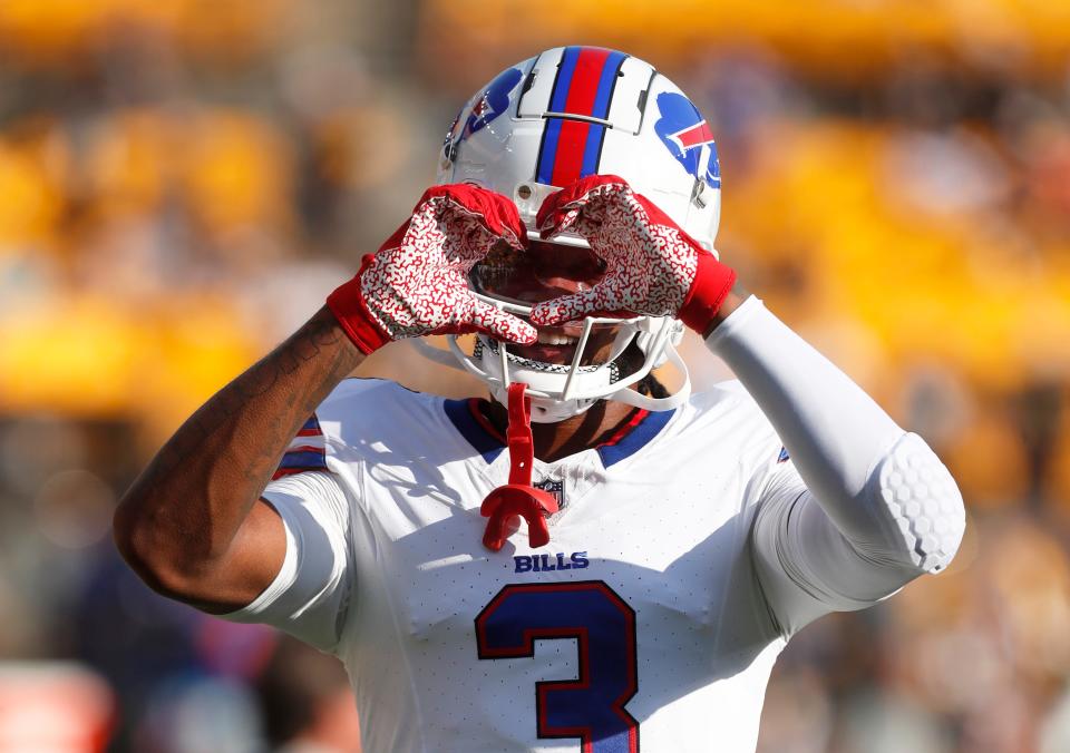 Buffalo Bills safety Damar Hamlin gestures during warmups before the game against the Pittsburgh Steelers at Acrisure Stadium in August 2023.