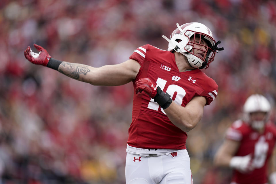 FILE - Wisconsin linebacker Nick Herbig (19) celebrates after forcing a fumble against Iowa that Wisconsin recovered during the first half of an NCAA college football game Saturday, Oct. 30, 2021, in Madison, Wis. Herbig is ready to lead a Wisconsin defense that must replace eight of its top 10 tacklers from last season. (AP Photo/Andy Manis, File)