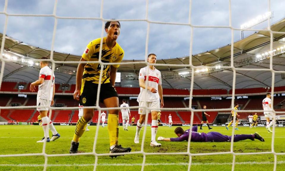 Jude Bellingham cheekily celebrates Marco Reus’s goal against Stuttgart – the 17-year-old had earlier scored for the first time in the Bundesliga.