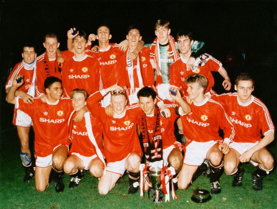 the manchester united team celebrate with the fa youth cup in 1992 at old trafford