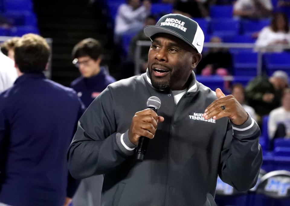 Middle Tennessee’s new head football coach Derek Mason speaks to the crown during the men’s basketball game between Middle Tennessee and Belmont on Saturday, Dec. 9, 2023, at MTSU..