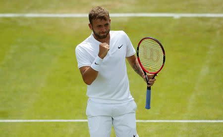 Britain Tennis - Wimbledon - All England Lawn Tennis & Croquet Club, Wimbledon, England - 30/6/16 Great Britain's Daniel Evans celebrates during his match against Ukraine's Alexandr Dolgopolov REUTERS/Andrew Couldridge