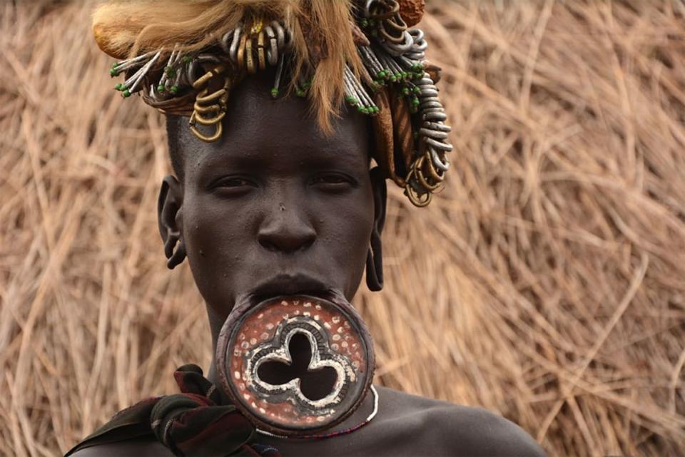 <div class="inline-image__caption"><p>A Mursi woman wearing a traditional lip plate.</p></div> <div class="inline-image__credit">Lourdeschr/Wikimedia Commons</div>