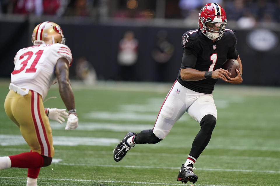 Atlanta Falcons quarterback Marcus Mariota (1) runs against the San Francisco 49ers during the second half of an NFL football game, Sunday, Oct. 16, 2022, in Atlanta. (AP Photo/Brynn Anderson)