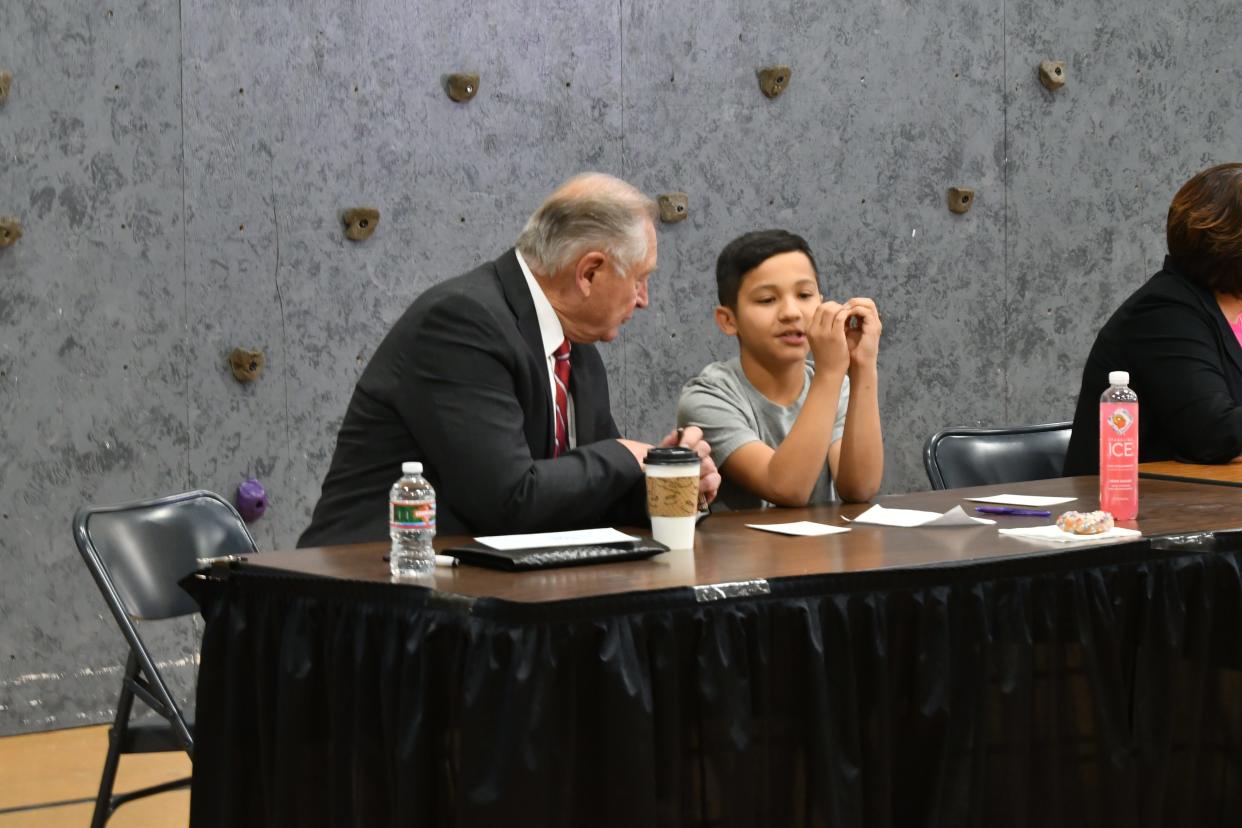 Pueblo Mayor Nick Gradisar is mentored by Minnequa Elementary School fifth grader Gio Lopez Trevino.