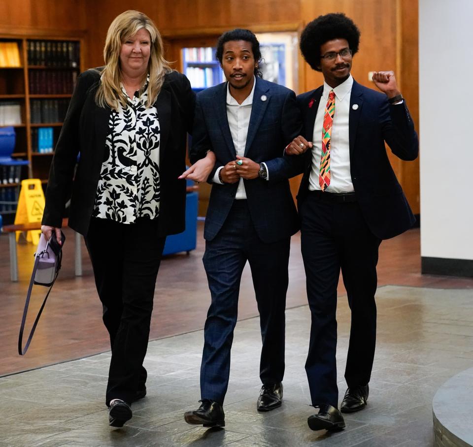 Gloria Johnson, D-Knoxville, left, Justin Jones, center, and Justin Pearson arrive at Fisk University in Nashville, Tenn., on Friday, April 7, 2023, where they are meeting with Vice President Kamala Harris. Jones and Pearson were expelled from the Tennessee House of Representatives the day before. Johnson survived an effort to expel her.