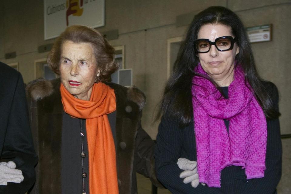 Liliane Bettencourt with her daughter Francoise Bettencourt Meyers in 2011 (REUTERS)