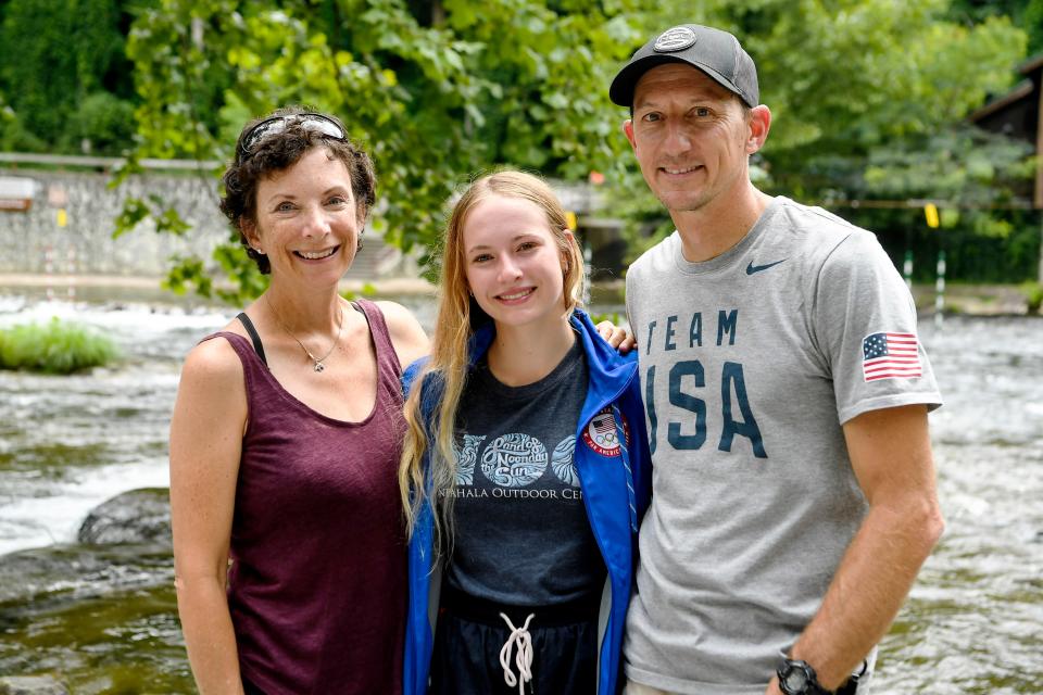 Evy Leibfarth with her mother, Jean Folger, a former whitewater paddling instructor, and father, Lee Leibfarth, a former U.S. Slalom Kayak National Team member, at the Nantahala Outdoor Center August 10, 2019.