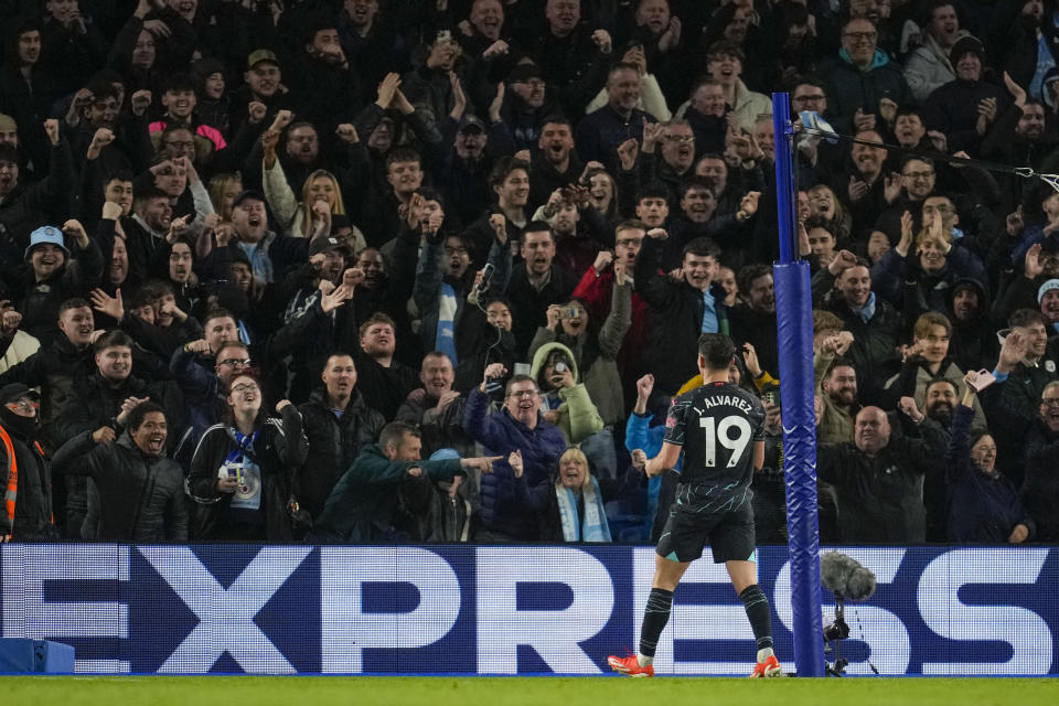 Manchester City's Julian Alvarez celebrates after scoring his side's fourth goal during the English Premier League soccer match between Brighton and Manchester City at the Falmer Stadium in Brighton, England, Thursday, April 25, 2024. (AP Photo/Kin Cheung)