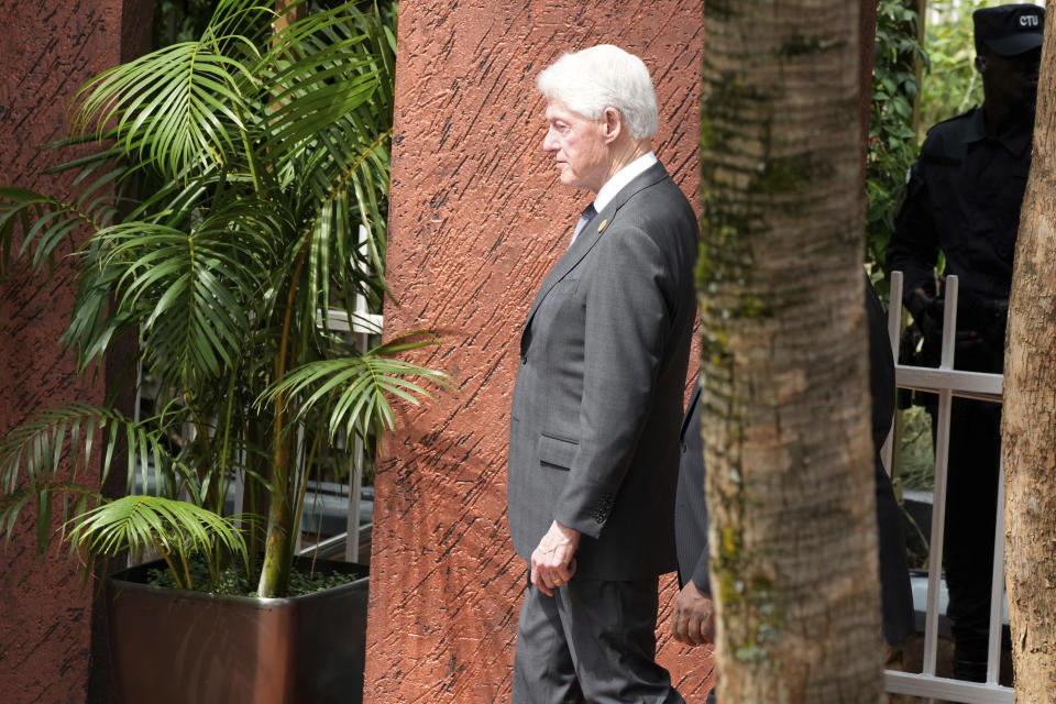 Former US President Bill Clinton, arrives to lay a wreath at the Kigali Genocide Memorial, in Kigali, Rwanda, Sunday, April 7, 2024. Rwandans are commemorating 30 years since the genocide in which an estimated 800,000 people were killed by government-backed extremists, shattering this small east African country that continues to grapple with the horrific legacy of the massacres. (AP Photo/Brian Inganga)
