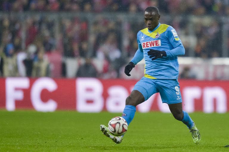 Cologne's Nigerian striker Anthony Ujah plays the ball during a German first division Bundesliga football match in Munich, southern Germany, on February 27, 2015