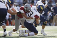 Washington State defensive end Ron Stone Jr., left, sacks Northern Colorado quarterback Jacob Sirmon (3) during the first half of an NCAA college football game, Saturday, Sept. 16, 2023, in Pullman, Wash. (AP Photo/Young Kwak)