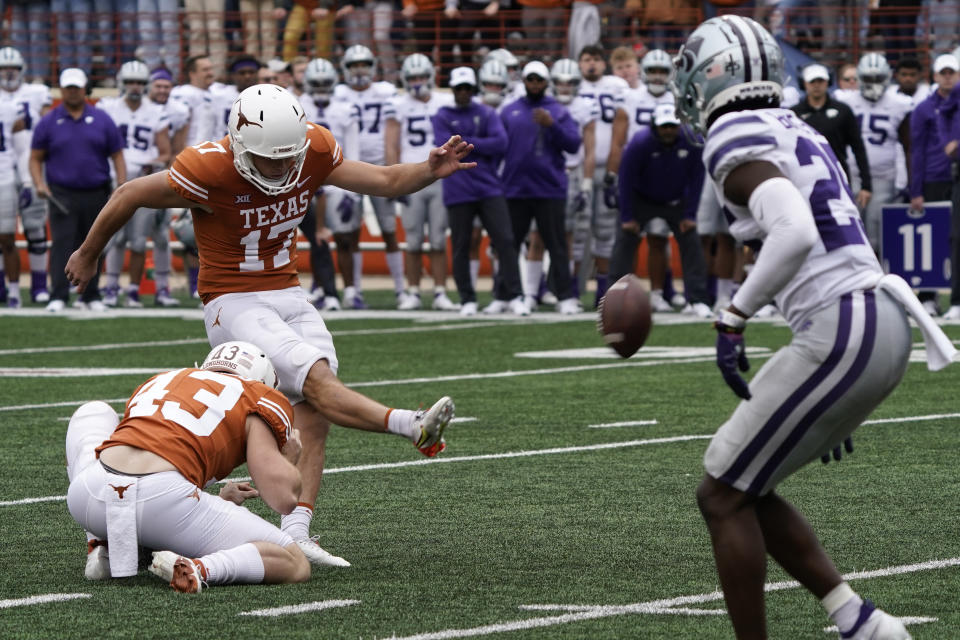 Texas place kicker Cameron Dicker (17) kicks a field goal against Kansas State during the second half of an NCAA college football game in Austin, Texas, Friday, Nov. 26, 2021. (AP Photo/Chuck Burton)