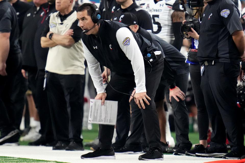 Cincinnati Bearcats head coach Luke Fickell observes play in the fourth quarter during the College Football Playoff semifinal game against the Alabama Crimson Tide at the 86th Cotton Bowl Classic, Friday, Dec. 31, 2021, at AT&T Stadium in Arlington, Texas. The Alabama Crimson Tide defeated the Cincinnati Bearcats, 27-6. 